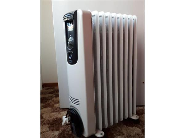 ~/upload/Lots/48344/l5zhv2njzfl7i/LOT 69 HEATER DELONGHI_t600x450.jpg